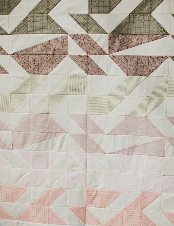 https://www.cottoneerfabrics.com/wp-content/uploads/voyage-quilt-in-serenity-by-arve-handmade-for-suzy-quilts-5.jpg